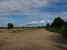 tn 2 Clear land, asphalt road at two sides,