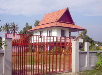 pic Big land with a small house