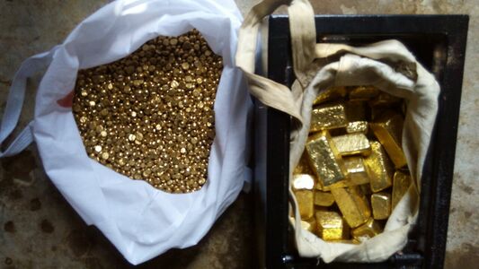 pic Gold bars , nuggets and dust for sale . 